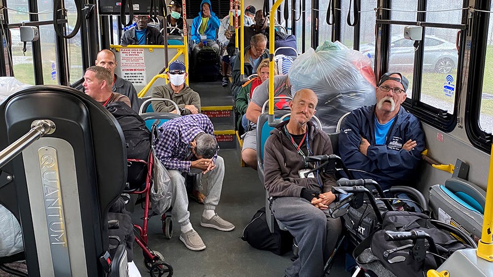 A few from the homeless community in Palm Beach County being transported to a nearby shelter on a Palm Tran fixed-route bus on Wednesday, Nov. 9, 2022.
