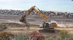 Excavator picking up dirt Excavator picking up dirt