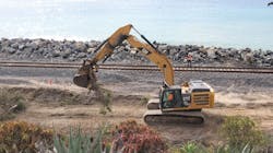 Excavator picking up dirt Excavator picking up dirt