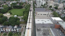 Looking down at the elevated guideway, with girders installed in the foreground. Looking down at the elevated guideway, with girders installed in the foreground.