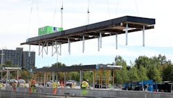 The canopy was built in segments and then lifted and lowered into position on the platform. The canopy was built in segments and then lifted and lowered into position on the platform.