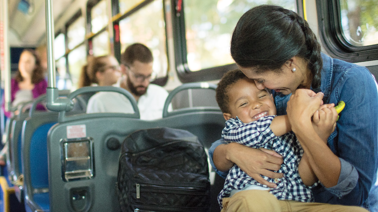 A mom caring for her child on a GRTC bus
