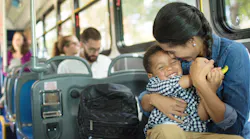 A mom caring for her child on a GRTC bus