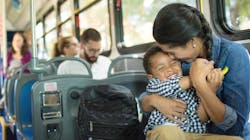 A mom caring for her child on a GRTC bus