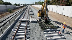 Crews installing light-rail tracks in Glendora. Crews installing light-rail tracks in Glendora.
