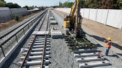 Crews installing light-rail tracks in Glendora.