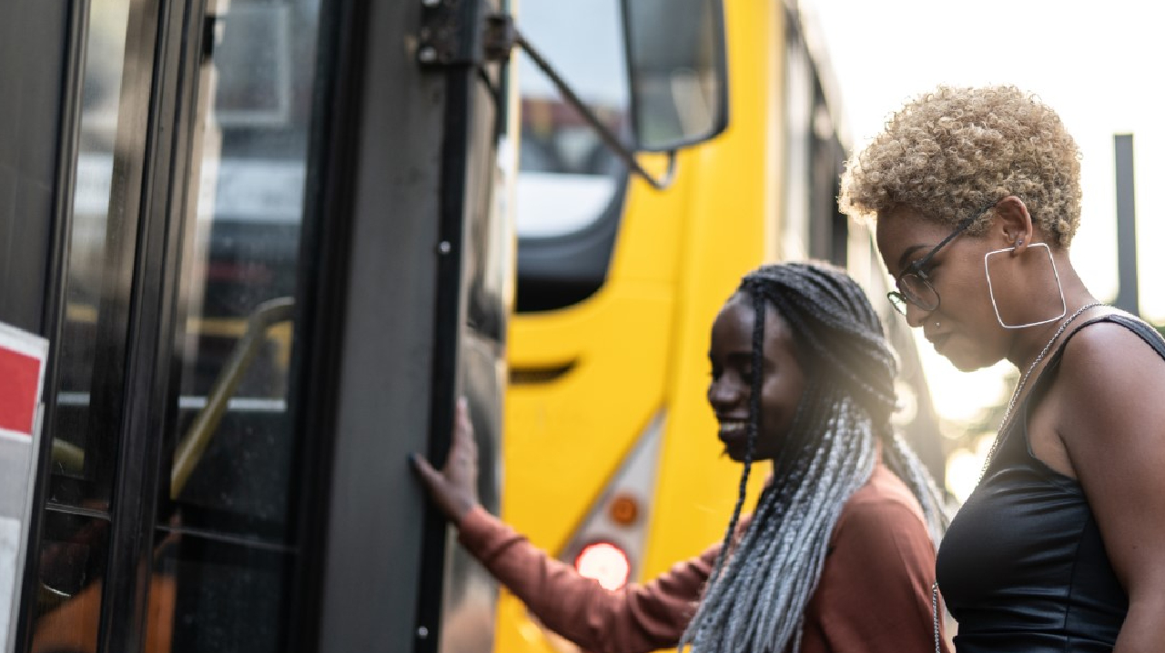 Women boarding bus