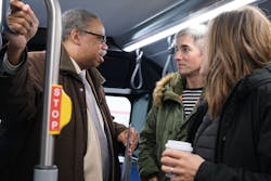Passengers aboard a CTA bus Passengers aboard a CTA bus