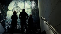 Residents looking at The Time Telling art piece up at Penn Station. Residents looking at The Time Telling art piece up at Penn Station.