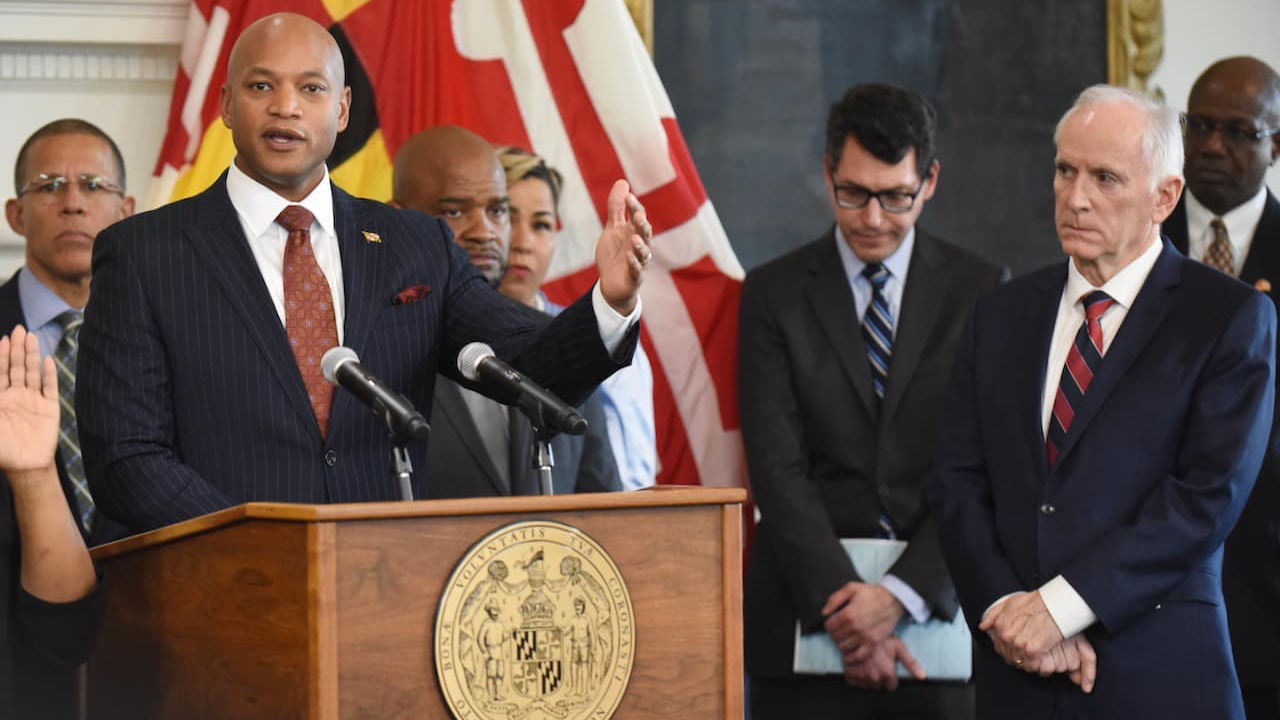 Gov. Moore speaks at an event where he announced Paul Wiedefeld, right, is his nominee to serve as Maryland&apos;s secretary of transportation.