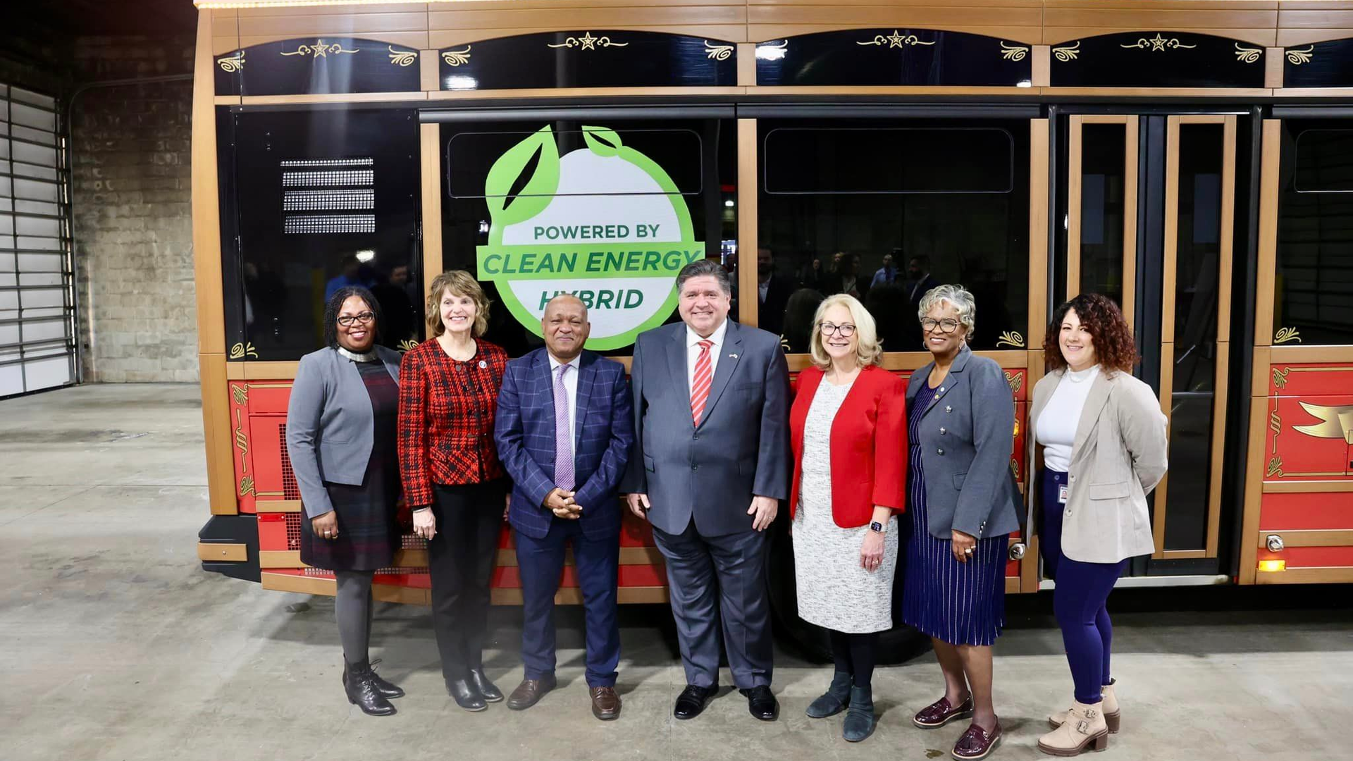 Illinois Gov. Pritzker, center, is joined by local elected officials and Illinois Department of Transportation leadership at a Jan. 24 event detailing the third round of Rebuild Illinois grants awarded to downstate transit agencies.