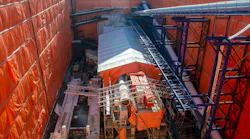 A closer look at the TBM in the launch shaft as it starts to dig.