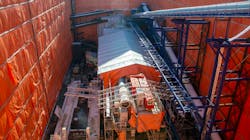 A closer look at the TBM in the launch shaft as it starts to dig. A closer look at the TBM in the launch shaft as it starts to dig.
