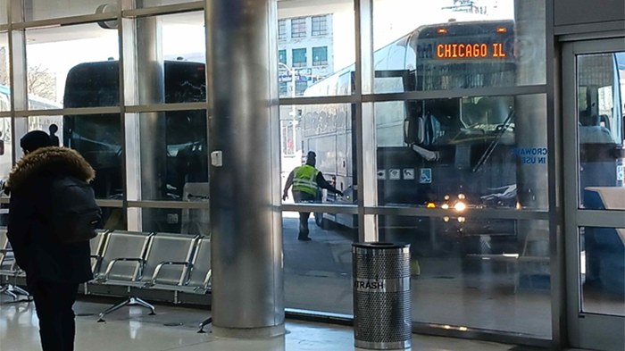 A driver readies a coach for an afternoon departure at Detroit Greyhound Station in February 2023.