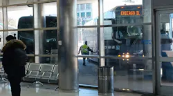 A driver readies a coach for an afternoon departure at Detroit Greyhound Station in February 2023.