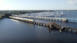 A Brightline train traverses the existing St. Lucie River Rail Bridge. Brightline has obtained clearance from the U.S. Coast Guard to temporarily close the waterway in order to perform rehabilitation work on the bridge.