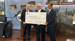 Left, Omnitrans Board Chair John Dutrey, SBCTA Board President Art Bishop and FTA Region 9 Administrator Ray Tellis ushered in a new era of sustainable transit in San Bernardino County on Monday with the presentation of an $86.75 million check for the West Valley Connector.