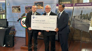 Left, Omnitrans Board Chair John Dutrey, SBCTA Board President Art Bishop and FTA Region 9 Administrator Ray Tellis ushered in a new era of sustainable transit in San Bernardino County on Monday with the presentation of an $86.75 million check for the West Valley Connector.