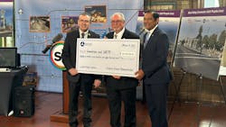 Left, Omnitrans Board Chair John Dutrey, SBCTA Board President Art Bishop and FTA Region 9 Administrator Ray Tellis ushered in a new era of sustainable transit in San Bernardino County on Monday with the presentation of an $86.75 million check for the West Valley Connector. Left, Omnitrans Board Chair John Dutrey, SBCTA Board President Art Bishop and FTA Region 9 Administrator Ray Tellis ushered in a new era of sustainable transit in San Bernardino County on Monday with the presentation of an $86.75 million check for the West Valley Connector.