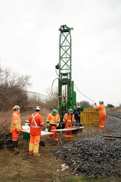 A drill in action, gathering soil samples. A drill in action, gathering soil samples.
