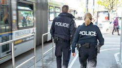 Two Metro Vancouver Transit Police officers on patrol.