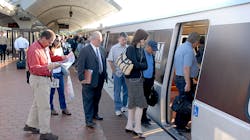 Passengers board a Metrorail Orange Line train. Passengers board a Metrorail Orange Line train.