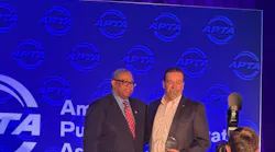 Dorval Carter, president, CTA. and New Transit accepting the Gold Award: Security for Bus System, with more than 20 million passenger trips annually.