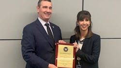 TSA Administrator David Pekoske, left, presents a plaque to NFTA Executive Director Kim Minkel indicating that NFTA received the Gold Standard Award. TSA Administrator David Pekoske, left, presents a plaque to NFTA Executive Director Kim Minkel indicating that NFTA received the Gold Standard Award.
