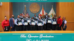 Pictured left to right on the bottom row: Records and Operations Analyst Gesselle Hernandez, Executive Director Clinton B. Forbes, Bus Operator Tracy Brooks, Bus Operator Raymond Johnson, Bus Operator Joseph Cineus, Bus Operator Mary Hargrett, Bus Operator Chelsea Coppel, Bus Operator De Nell Timothy, Bus Operator Pauris St. Val, Bus Operator LaTonya Simeton, Safety and Training Officer Fred Richardson and Bus Operator Loretta Fuegos. Pictured left to right on the top row: Bus Operator Aamer Semuel, Mayor Gregg K. Weiss, Bus Operator Jean Moise, Assistant County Administrator Todd J. Bonlarron, Commissioner Michael A. Barnett and InterimSafety and Training Operations Manager Delvon Meredith.