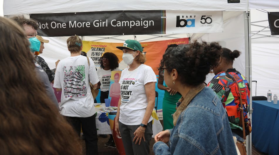 A booth featuring BART&apos;s Not One More Girl Campaign at the authority&apos;s 50th anniversary celebration.