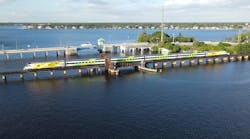 A Brightline train travels across the St. Lucie Railroad Bridge. Rehabilitation work on the bridge was completed in May.