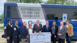 (L to R) Dispatcher/Supervisor Maurice Shelton, Bus Operator Barbette Easley, Pace Director John Noak, Pace Executive Director Melinda J. Metzger, Congressman Bill Foster, Pace Chairman Rick Kwasneski, Bolingbrook Mayor Mary Alexander-Basta, Pace Director Jeff Schielke and Will County Executive Jennifer Bertino-Tarrant receive funding in front of an I-55 Express Bus that will serve the improved facility. (L to R) Dispatcher/Supervisor Maurice Shelton, Bus Operator Barbette Easley, Pace Director John Noak, Pace Executive Director Melinda J. Metzger, Congressman Bill Foster, Pace Chairman Rick Kwasneski, Bolingbrook Mayor Mary Alexander-Basta, Pace Director Jeff Schielke and Will County Executive Jennifer Bertino-Tarrant receive funding in front of an I-55 Express Bus that will serve the improved facility.