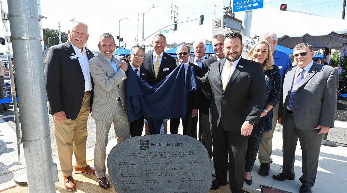 Ceremony Photo 2 - Elected and transportation officials unveiling an engraved boulder to commemorate the Foothill Gold Line Track Completion Ceremony on June 24, 2023, in La Verne, Calif.jpg