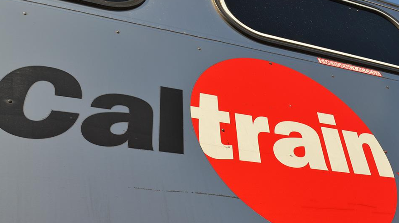 Caltrain logo on a train.