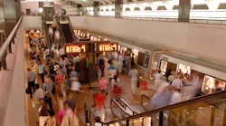 Customers at the Farragut North Metrorail station. Without a solution to its pending financial crisis, WMATA says service could end at 9:30 p.m. and train wait times would be between 20 and 30 minutes starting in FY24.