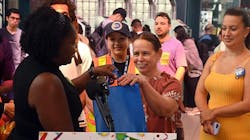 Candida Alfonso receiving her gift bag for being the 1 billionth taper on OMNY. Candida Alfonso receiving her gift bag for being the 1 billionth taper on OMNY.