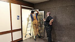 Crews put finishing touches on door at Embarcadero Station restroom. Crews put finishing touches on door at Embarcadero Station restroom.