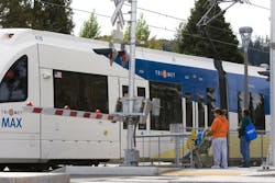 TriMet MAX Station rail crossing. TriMet MAX Station rail crossing.