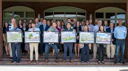 ​​​Representatives from partner communities received TOD 'playbooks' and development renderings at a May 2023 meeting in Apex.