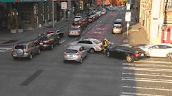 Traffic camera photo of vehicles blocking an intersection in Seattle&rsquo;s Belltown neighborhood.