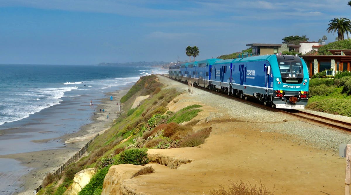 A Coaster train moving through Del Mar, Calif. NCTD has been awarded a state grant that will support its efforts to mitigate the impacts of sea level rise and extreme weather conditions.
