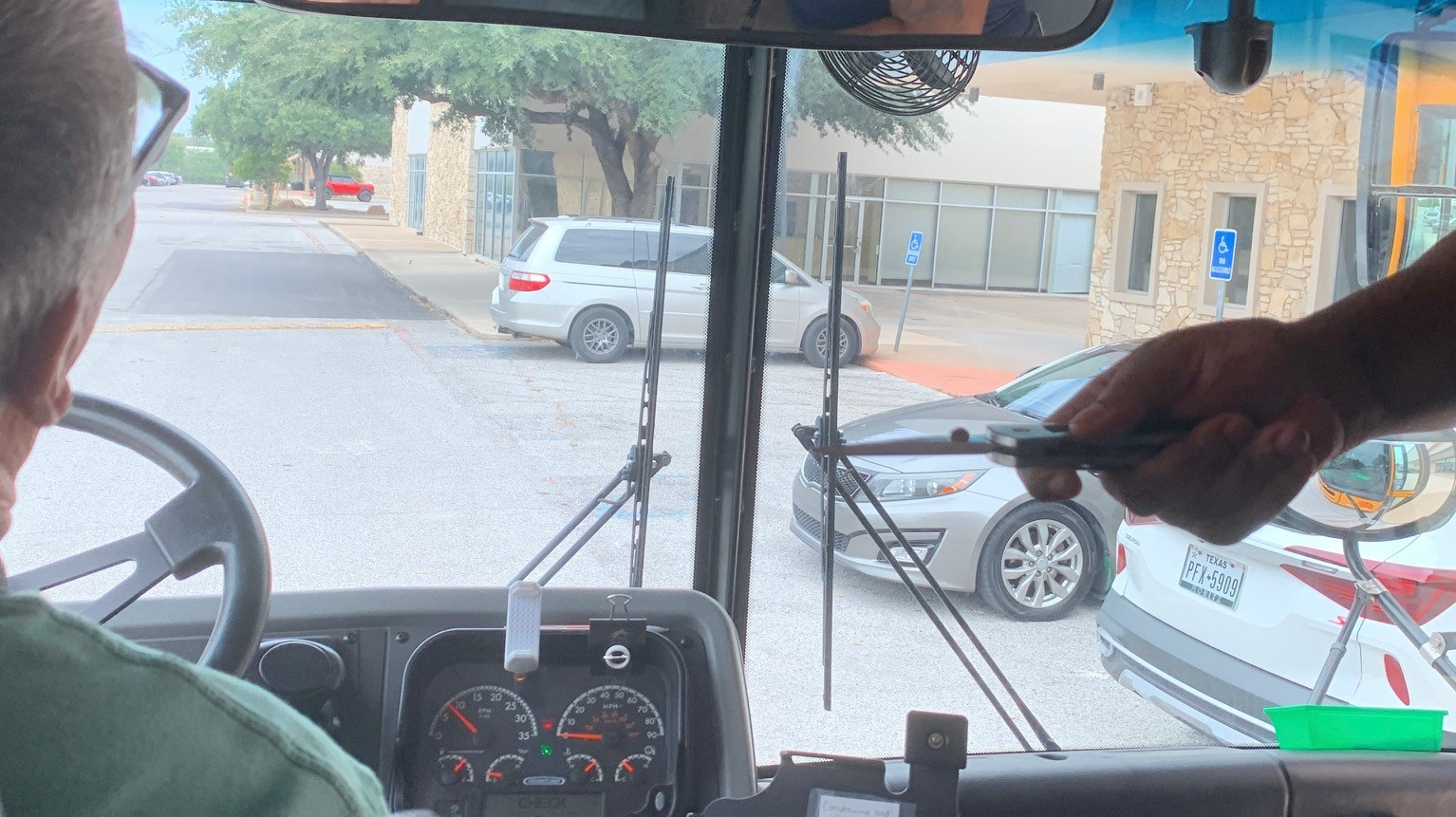 Bret training a bus driver.