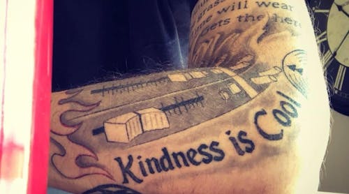Mike Bismeyer shares the mantra that &apos;kindness is cool;&apos; he even has the message inked on his arm.