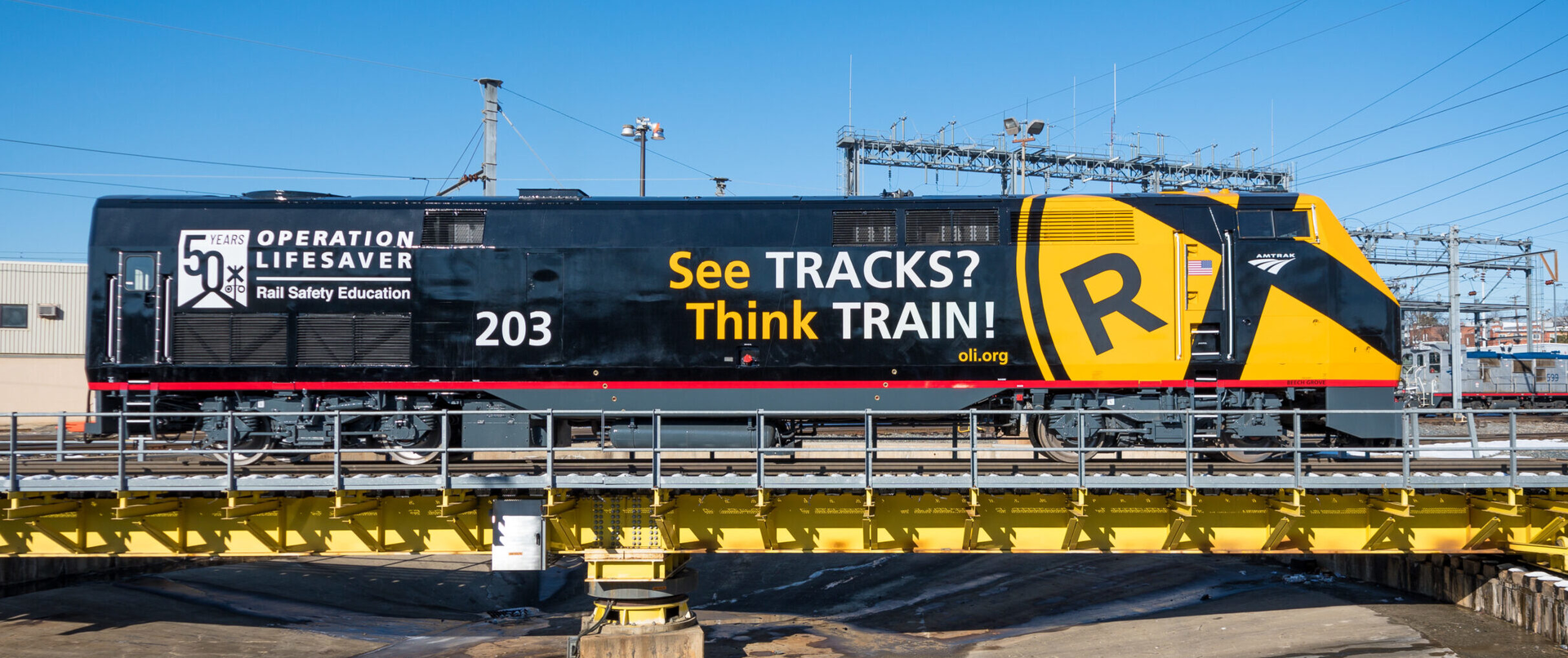 Amtrak train with Operation Lifesaver marketing for rail safety week.