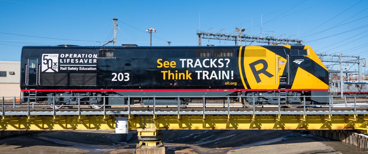Amtrak train with Operation Lifesaver marketing for rail safety week.