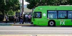 TriMet's signature big, green bus from Nova Bus. TriMet's signature big, green bus from Nova Bus.