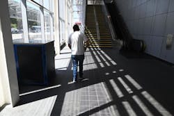 BART intern Erik Huizar studies the tactile guideway at Union City Station on Sept. 6, 2023. BART intern Erik Huizar studies the tactile guideway at Union City Station on Sept. 6, 2023.
