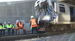NTSB investigators and CTA employees examine the site of the Nov. 16 accident where a CTA Yellow Line train collided with a piece of snow equipment.