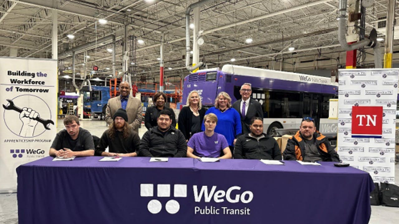 Front row left to right. Apprentice signees Adam AL-Hajjaj, William Martin, Eduardo Badillo, Brent Miner, Adrian Mayers and Charles Phelps. Back row left to right: WeGo Chief of Staff and Administration Vince Malone, WeGo State Apprenticeship Director Shalondria S. Shaw, WeGo Apprenticeship Specialist Steffany S. Daniel, Apprentice and WeGo Director of Administration Kym Tucker and WeGo CEO Steve Bland,