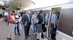 File image of passengers boarding a Metrorail Orange Line at New Carrollton station.